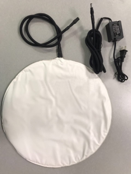 Low voltage D C far infrared pet heating pad with PTC and power cord chew