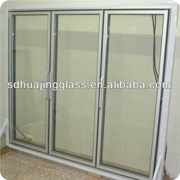Glass door merchandiser for commercial display