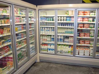 Glass door merchandiser for commercial display