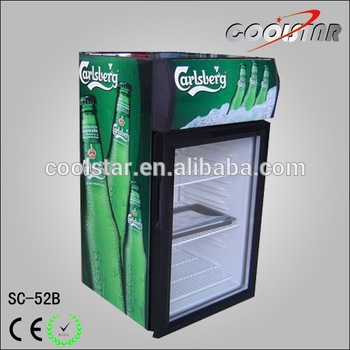 White liner drink chiller with advertisement stickers