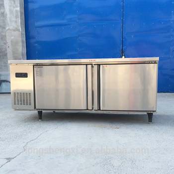 Low noise kitchen fridge with compressor